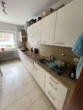 Küche - Familienfreundliche 3-Zimmerwohnung mit Balkon und Garage in zentraler Lage