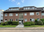 Außenansicht - Familienfreundliche 3-Zimmerwohnung mit Balkon und Garage in zentraler Lage